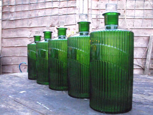 A Good Quintet of Late 19thC Fluted Green Glass Apothecary Bottles