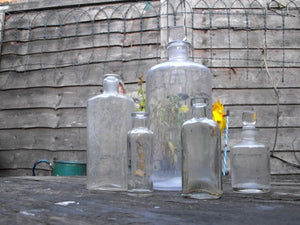 A Mixed Quintet of Late 19thC Plain Glass Apothecary Bottles
