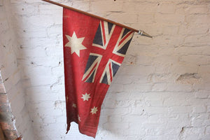 A Splendid British Empire Australian Red Ensign Flag Mounted on a Pole
