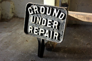 A Rather Fun Mid 20thC Cast Iron Sign; 'Ground Under Repair'