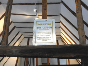 A Rare Early 20thC Mirror Sign for a Coin-Operated Fortune Telling Machine