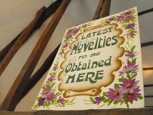 A Victorian Fairground Hand-Painted Showcard; 'Latest Novelties to be Obtained Here'