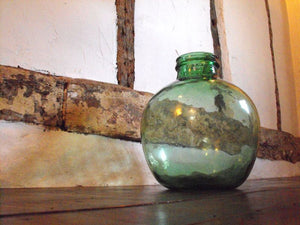 A Vintage Green Glass Carboy Bottle