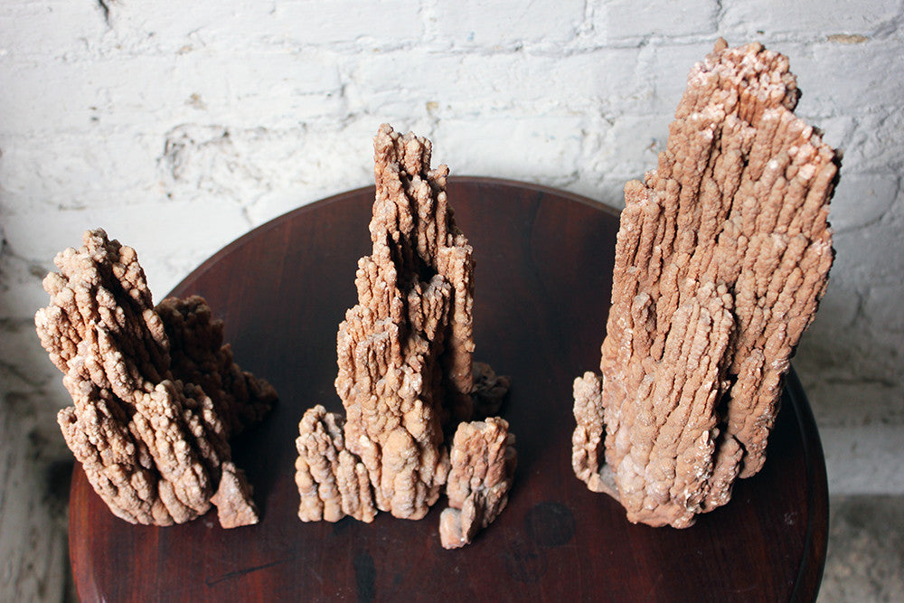 Scolar Rocks A Beautiful Group of Three Graduated Aragonite Scholar’s Rocks – Doe & Hope