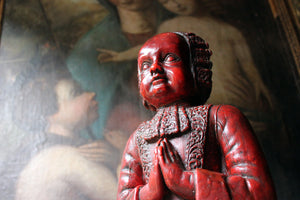 A Large 17thC Sculpted Red-Wax Figure of a Standing Child